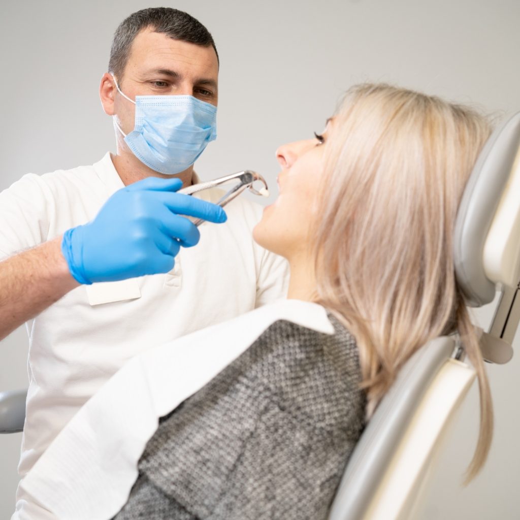 Dentist examining a patient's mouth